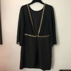 Open back dress with gold